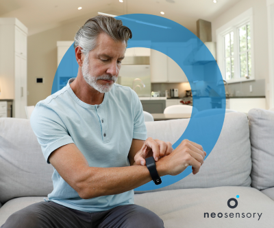 Neosensory product worn on man's wrist 